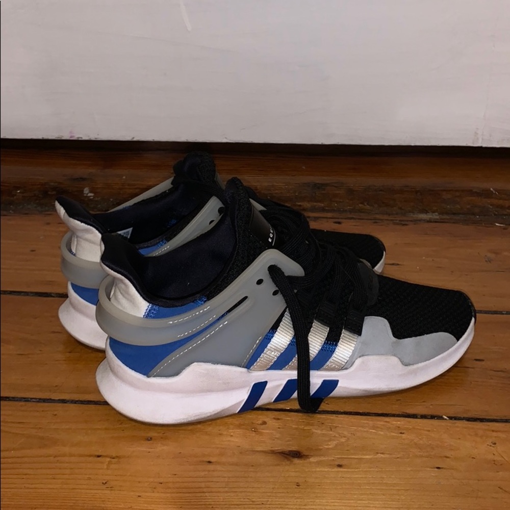 Black and blue adidas EQT